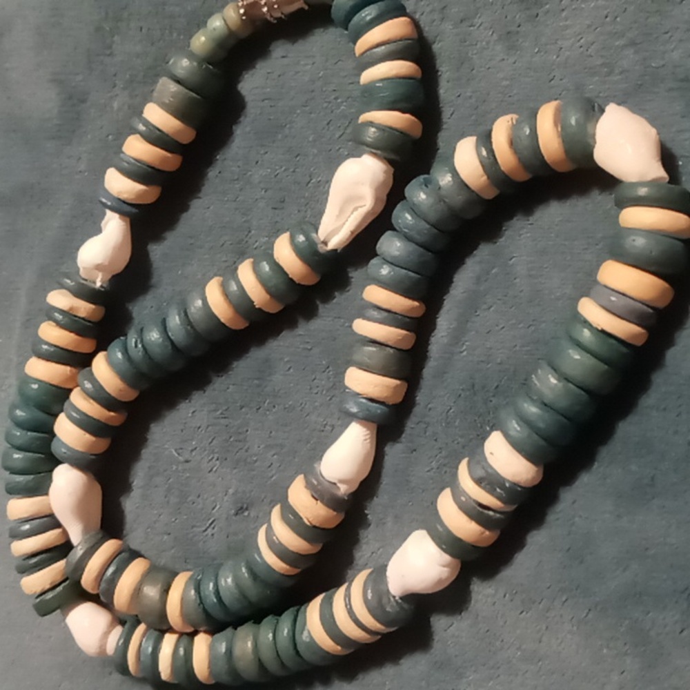Wooden & shell beaded necklace. 20 inch long. Blue tan white.